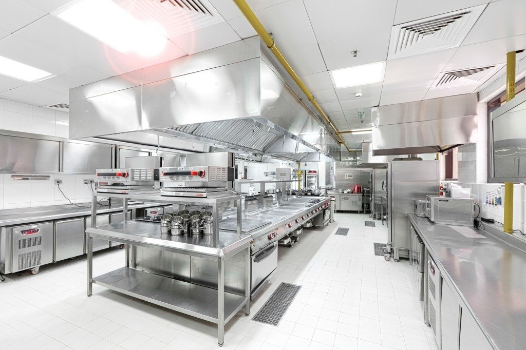 Installed commercial kitchen, stainless steel cooking line